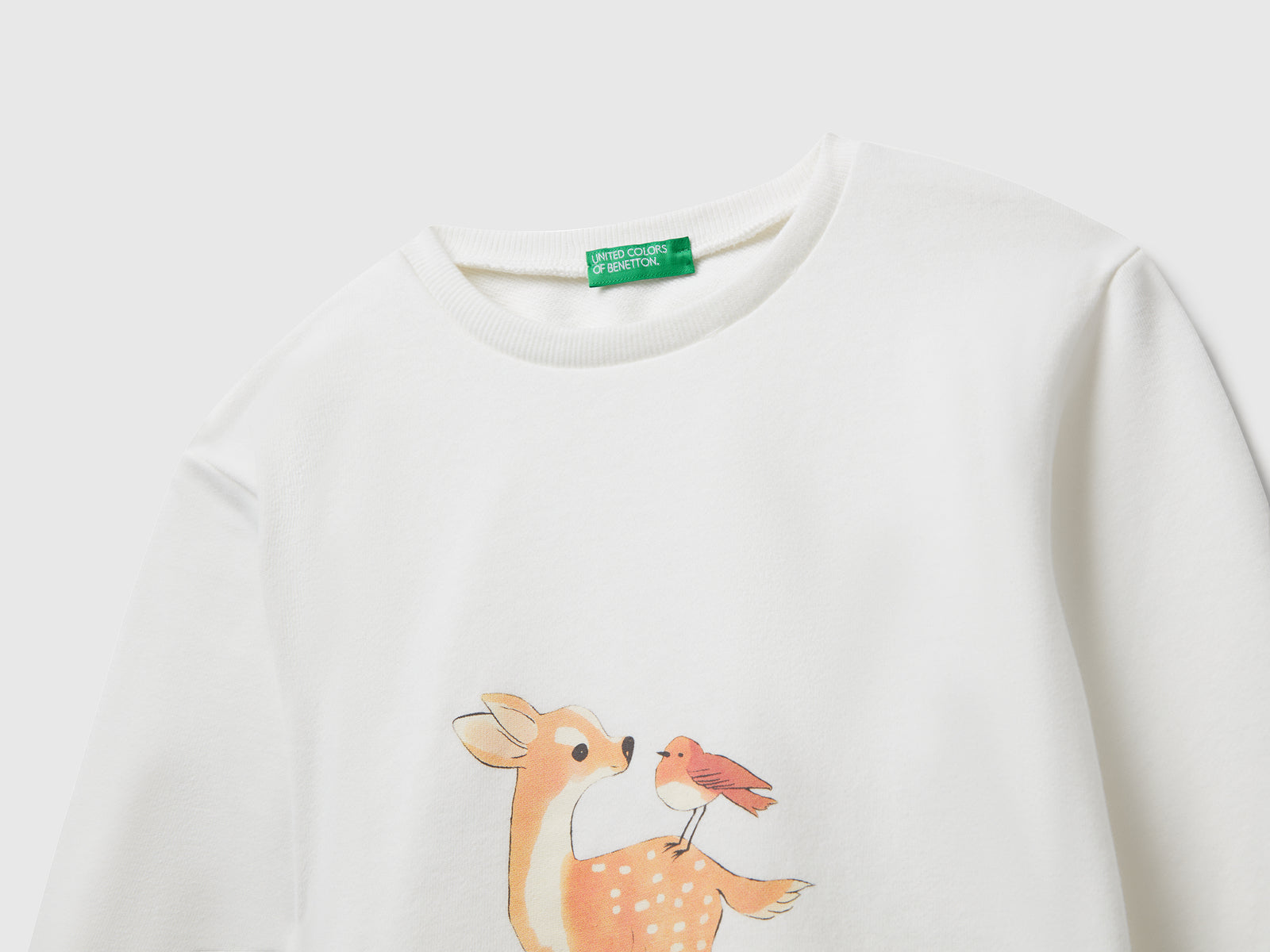 Felpina con stampa animaletti da bimba bianco panna 3 | Benetton Outlet