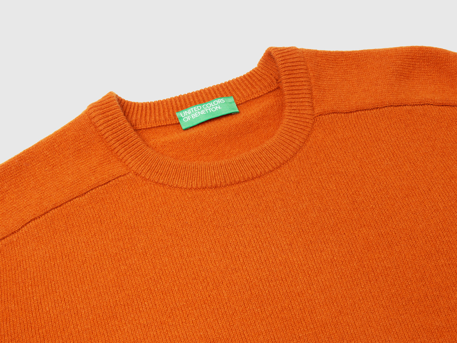 Maglia girocollo in pura lana Merino da uomo arancione 3 | Benetton Outlet