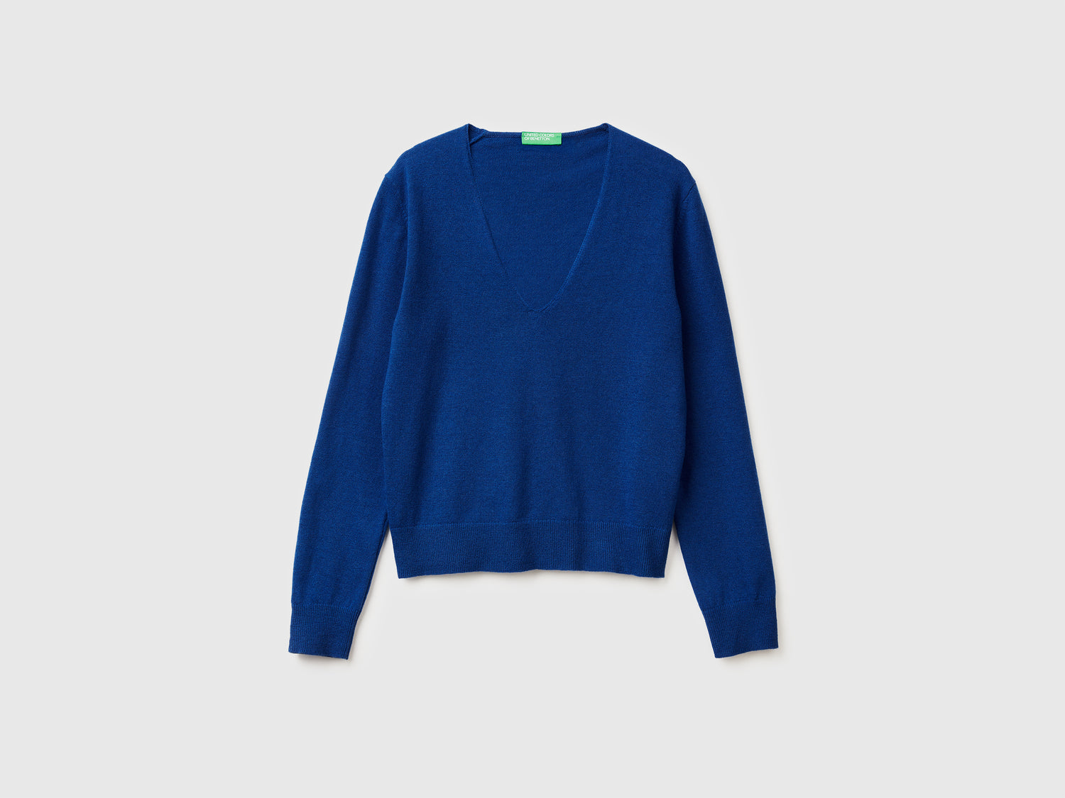 Maglione con scollo a V in pura lana Merino da donna blu | Benetton Outlet