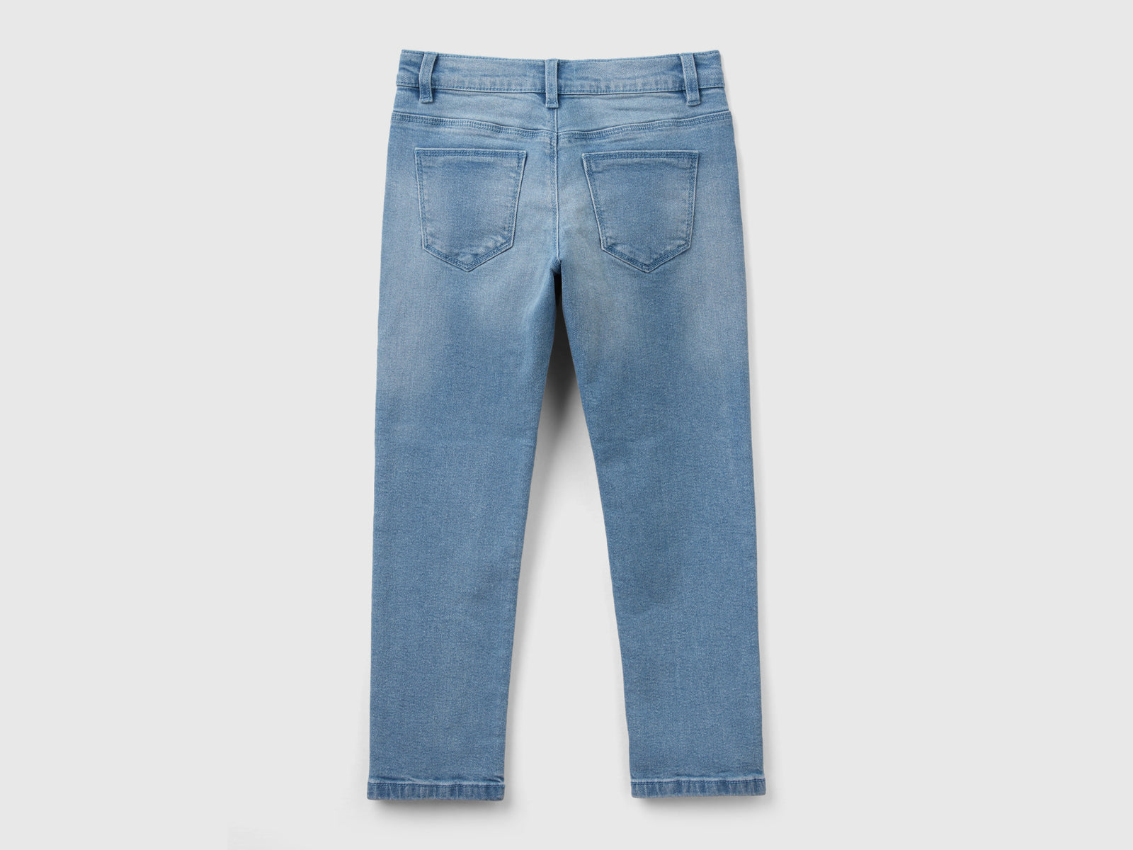 Slim fit jeans da bambina azzurro 2 | Benetton Outlet