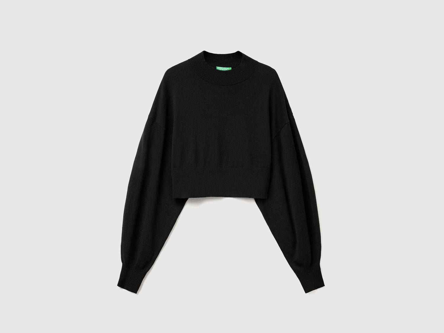 Maglia lupetto cropped da donna nero | Benetton Outlet