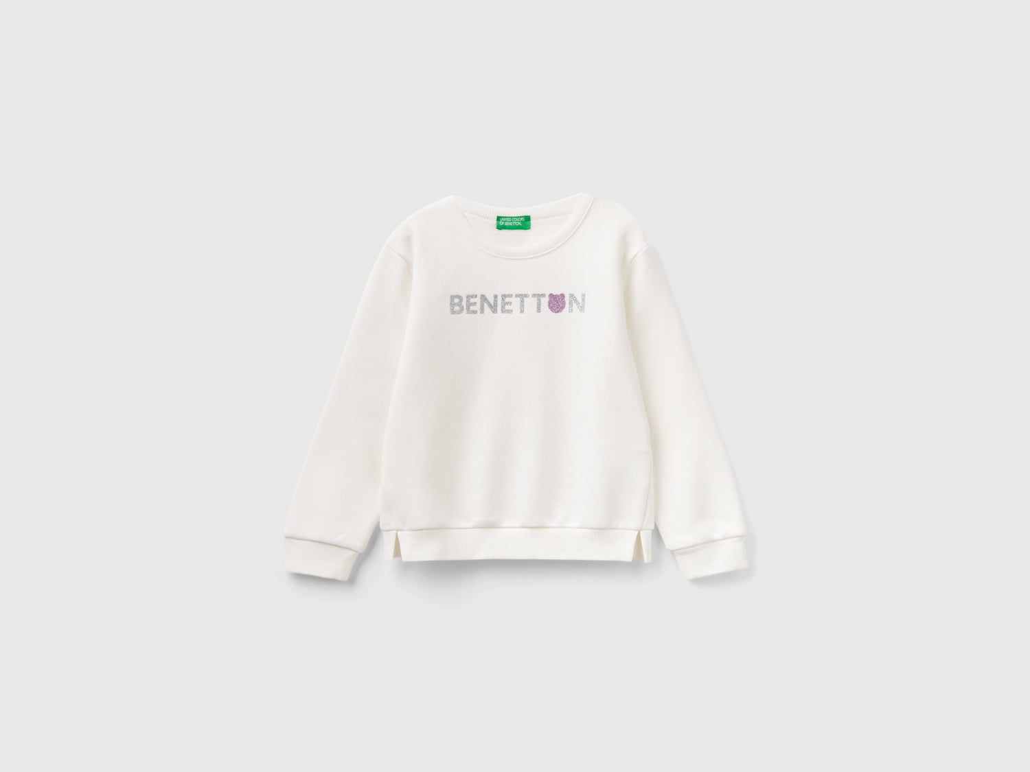 Felpa chiusa con stampa glitter da bimba bianco panna | Benetton Outlet