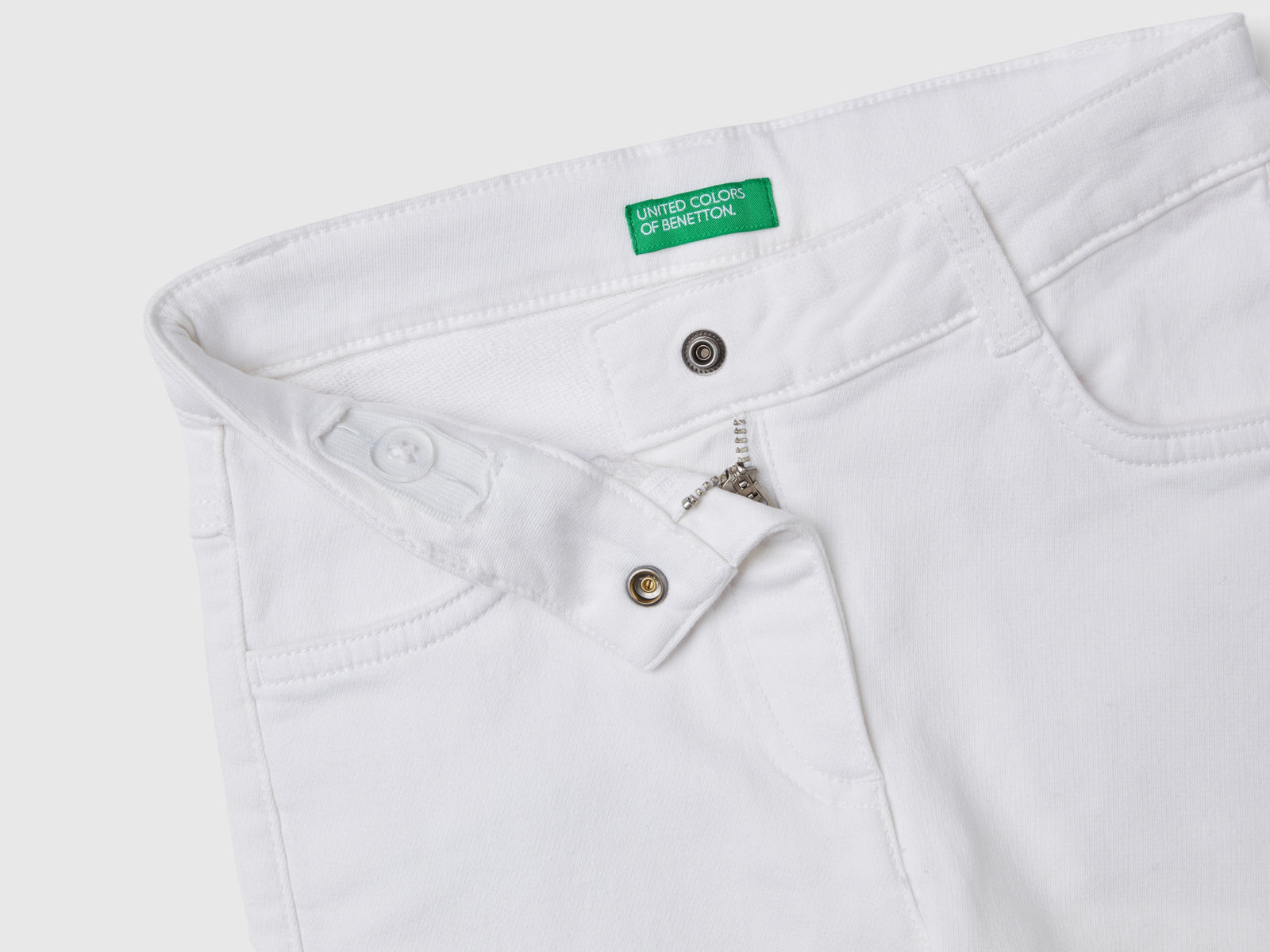 Pantaloni a zampa stretch da bambina bianco 3 | Benetton Outlet