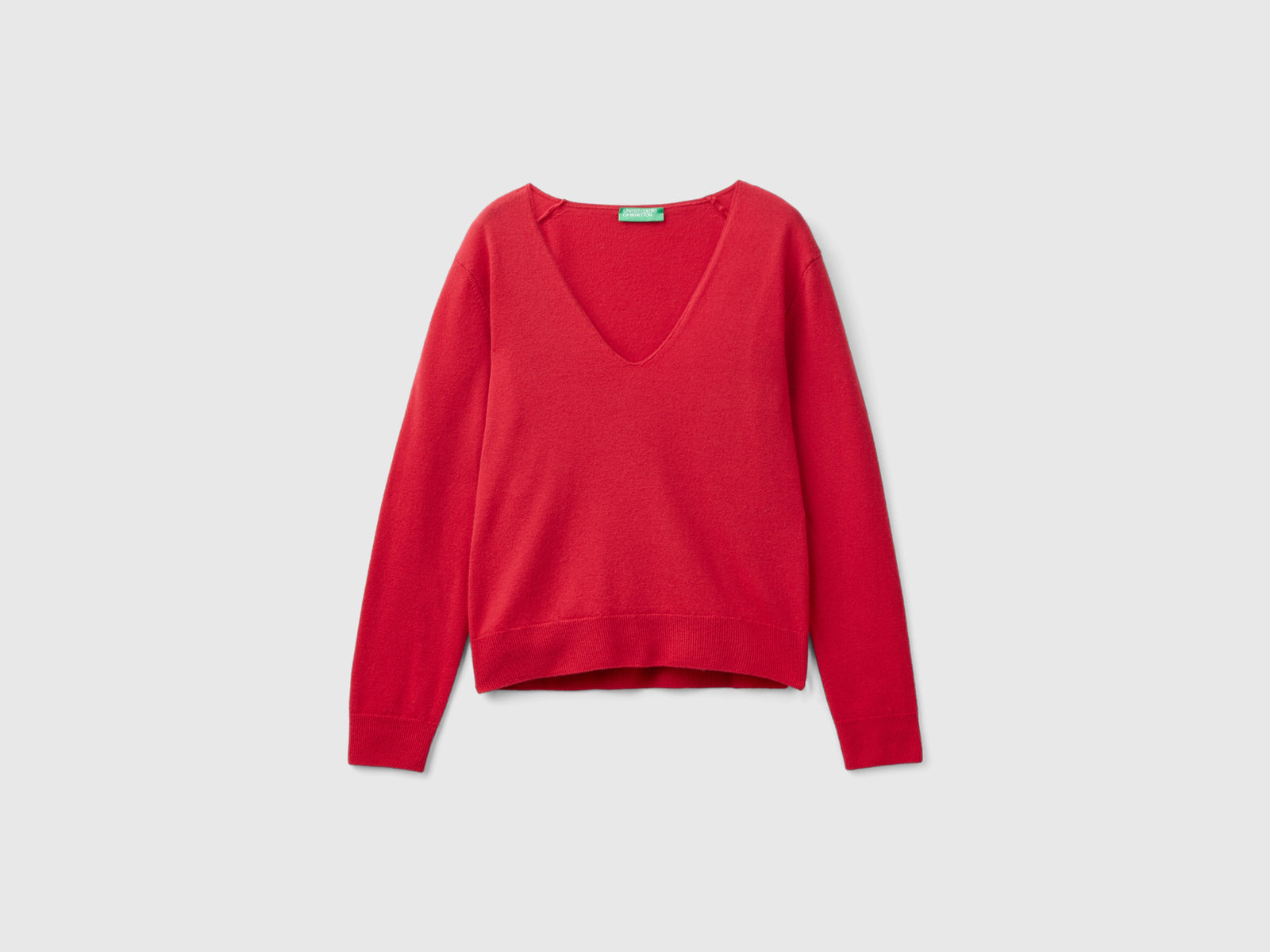 Suéter ciruela con escote en V de pura lana merina da donna rosso | Benetton Outlet