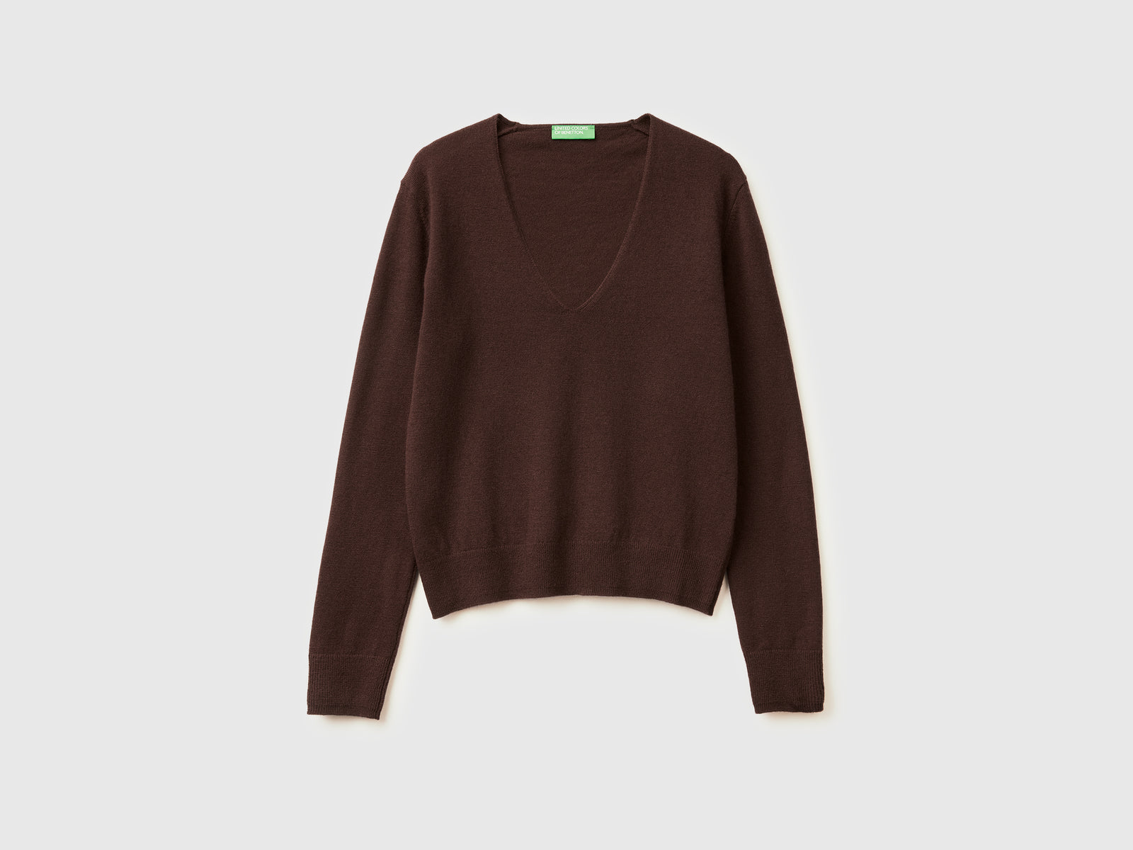 Maglione con scollo a V in pura lana Merino da donna marrone | Benetton Outlet