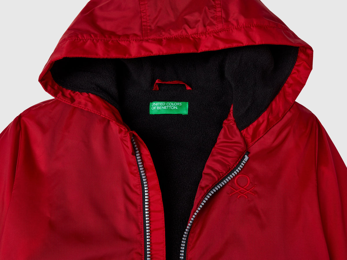Giubbino in nylon con zip e cappuccio