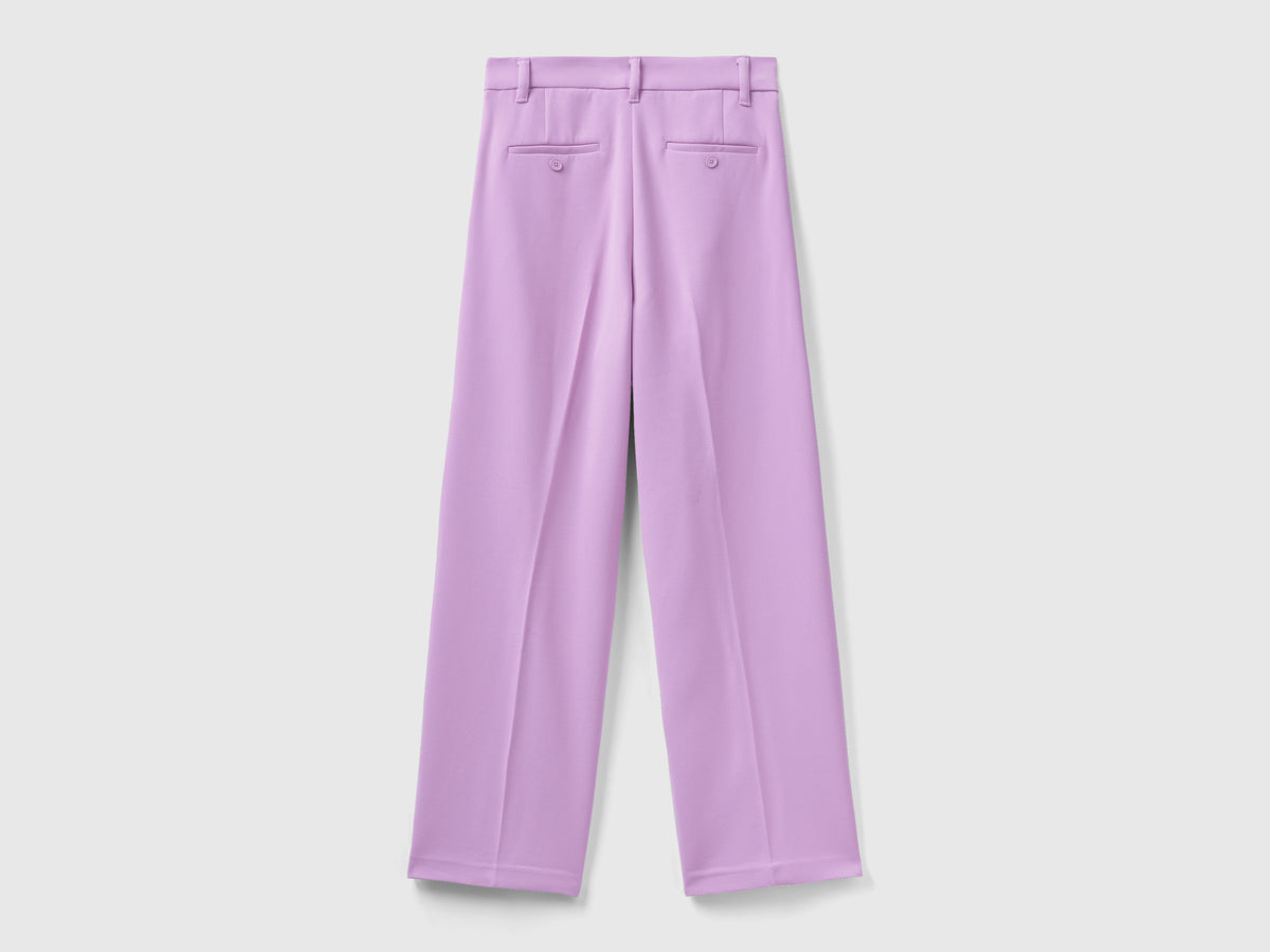 Pantaloni ampi con pieghe