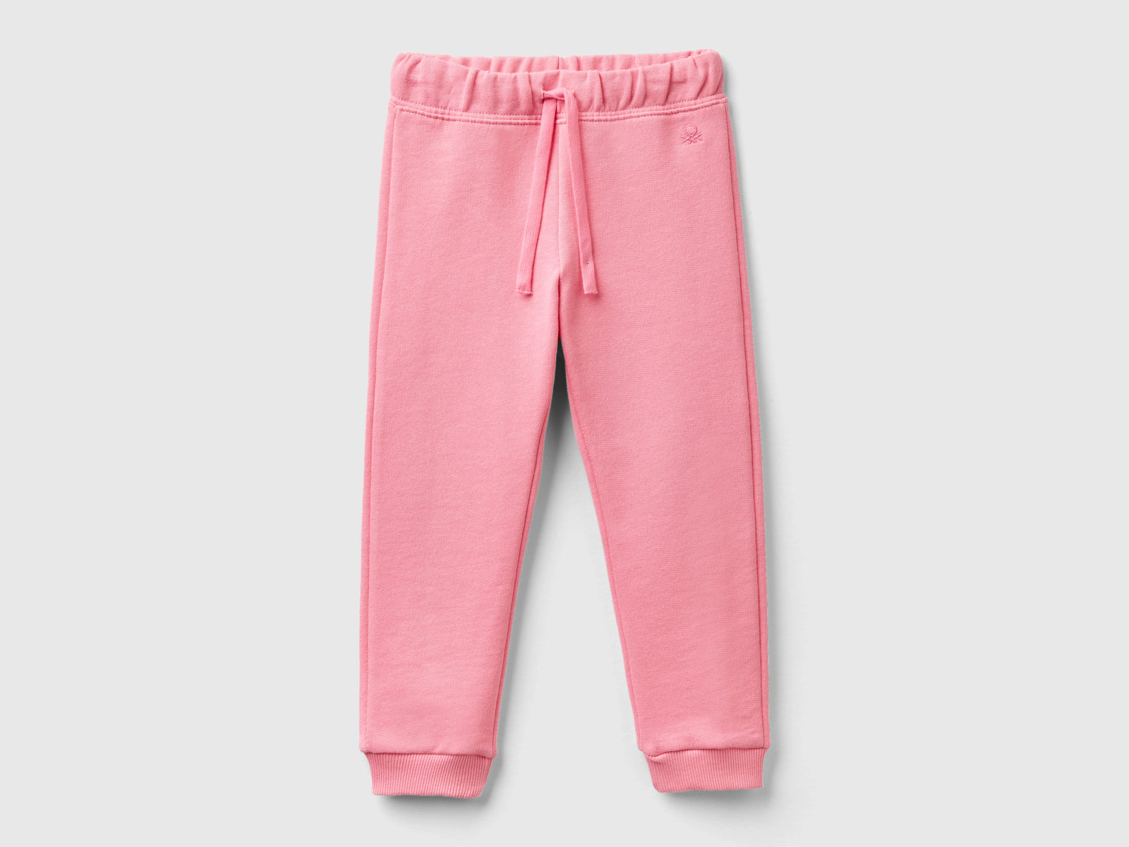 Pantaloni in felpa di cotone bio da bimba rosa | Benetton Outlet