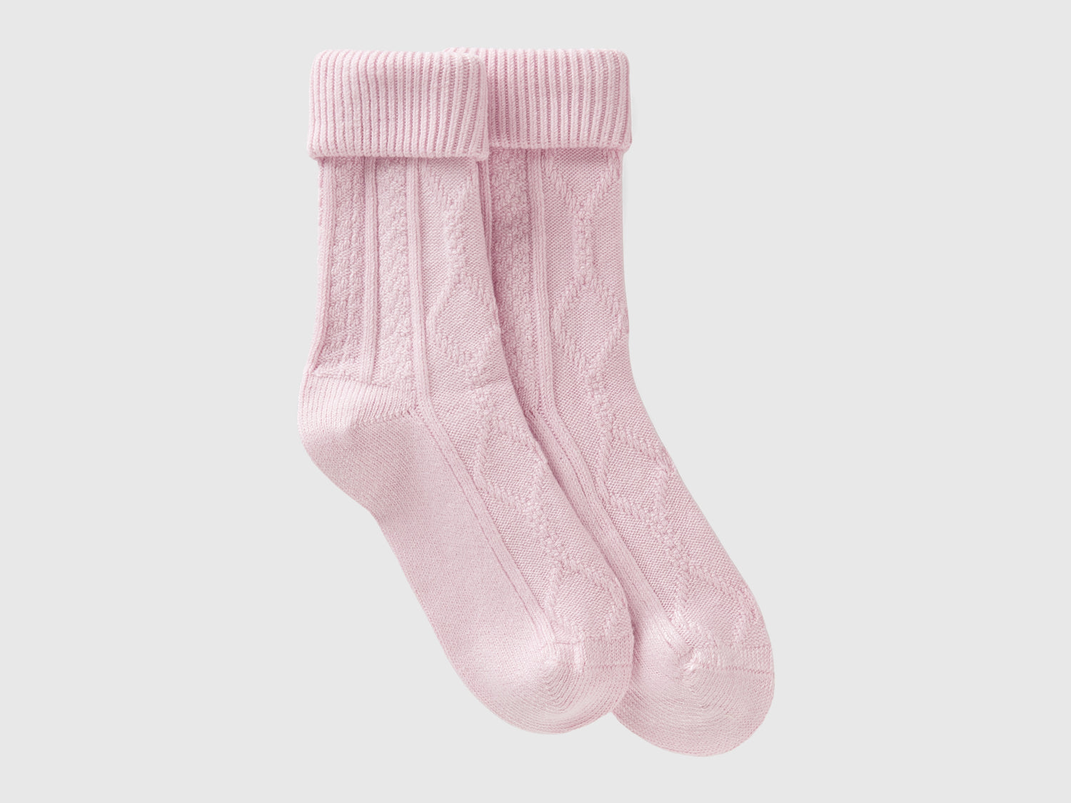 Calzini lunghi jacquard da donna rosa | Benetton Outlet