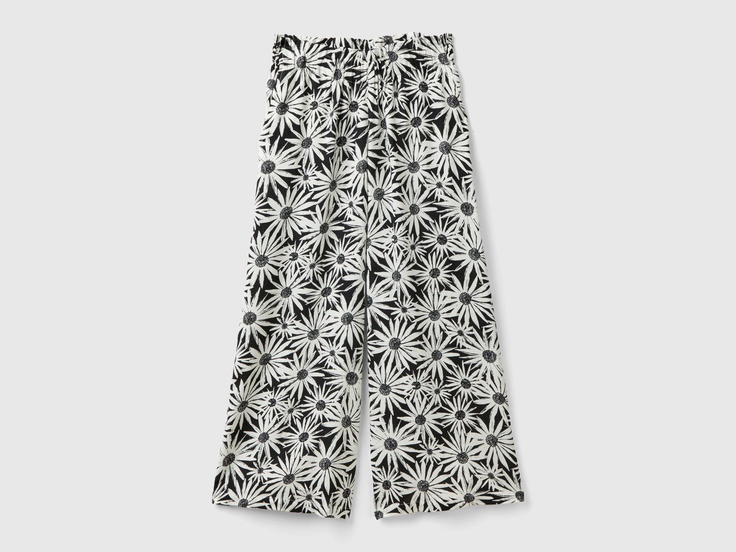 Pantaloni con stampa floreale da donna nero | Benetton Outlet
