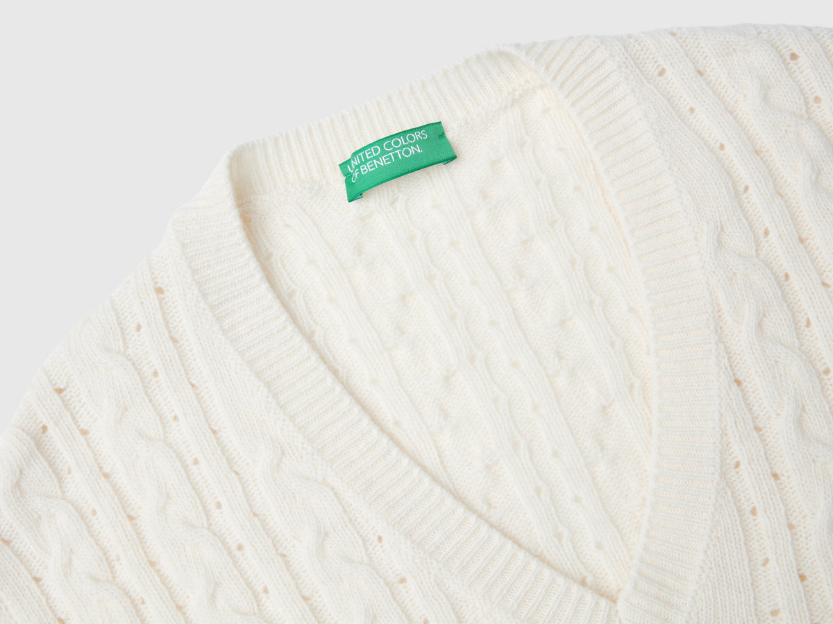 Boxy fit vest with braids and perforations