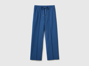 Pantaloni lunghi fluidi modello jogger in misto viscosa