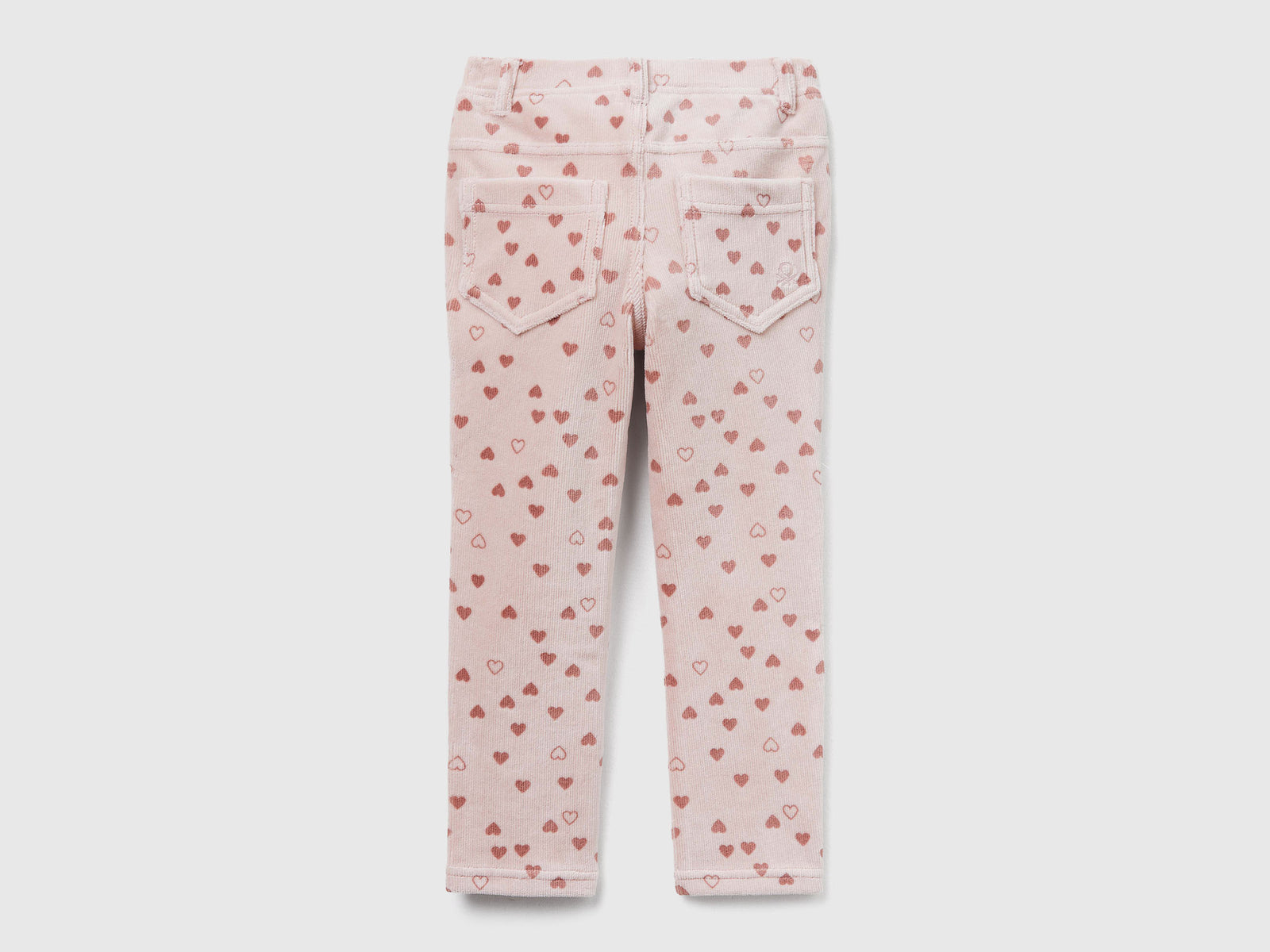 Pantaloni slim fit in ciniglia da bimba rosa 2 | Benetton Outlet