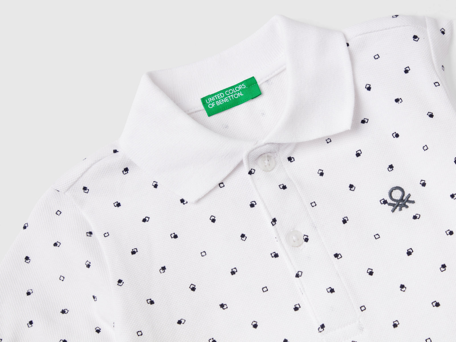 Polo micro fantasia slim fit da bimbo bianco 2 | Benetton Outlet