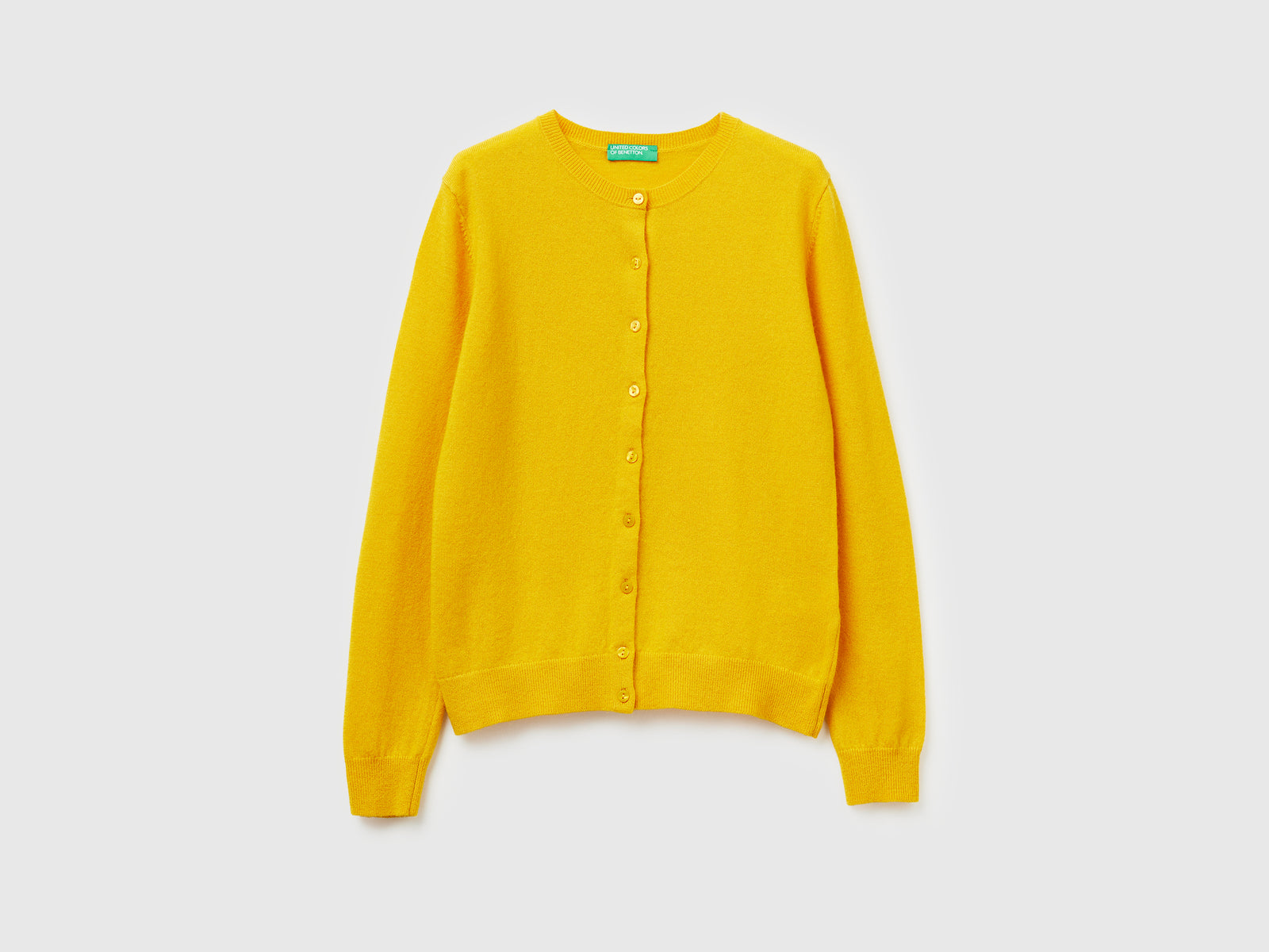 Cardigan girocollo giallo ocra in pura lana Merino da donna senape | Benetton Outlet