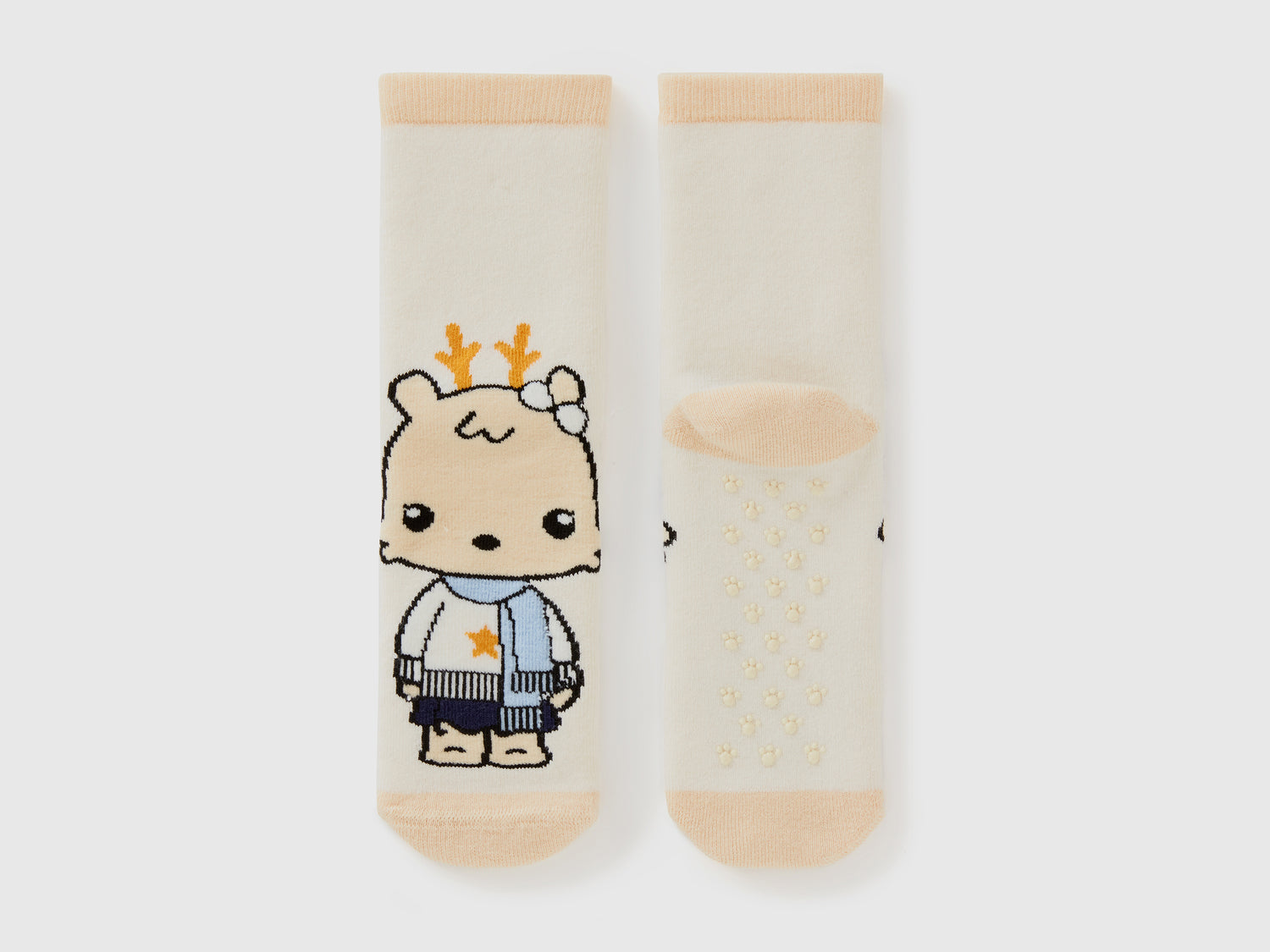 Calzini antiscivolo con mascotte da bambino beige | Benetton Outlet