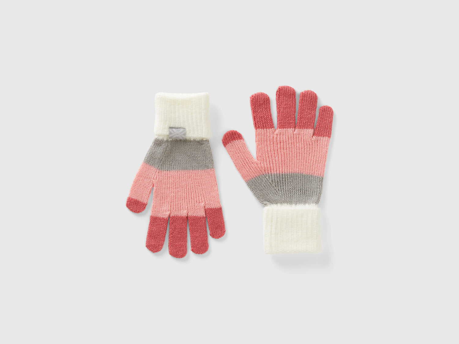 Guanti a righe da bambino salmone | Benetton Outlet