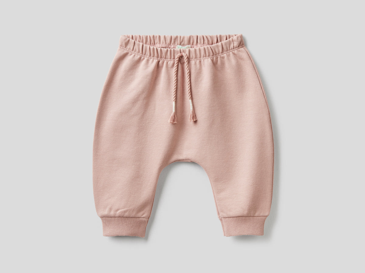Pantaloni in felpa con taschino e stampa