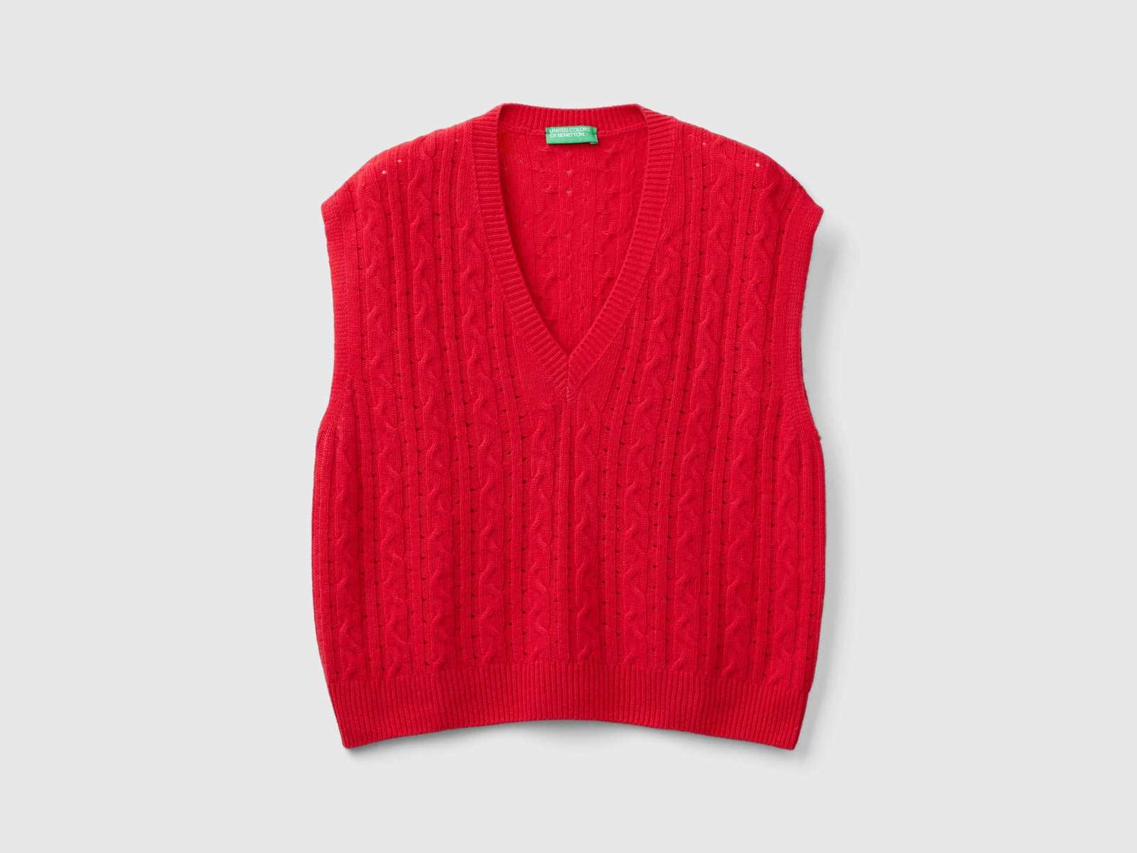Gilet boxy fit con trecce e trafori da donna rosso | Benetton Outlet