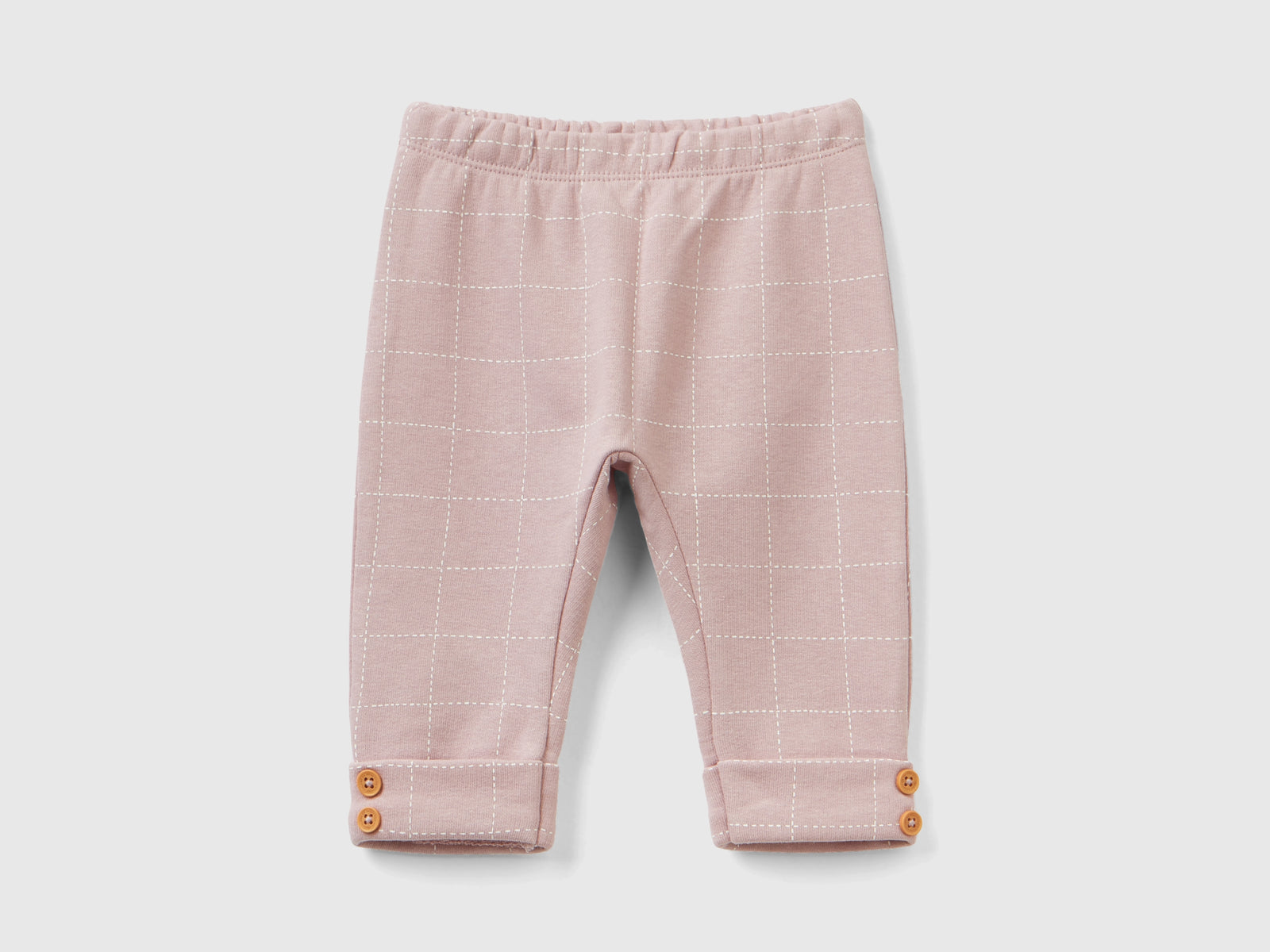Pantaloni in felpa a quadri da neonato rosa | Benetton Outlet