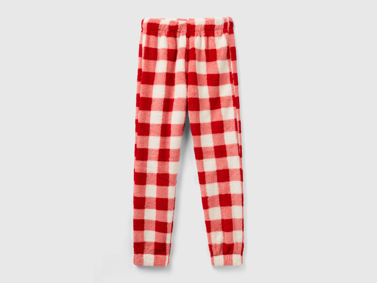 Pantaloni a quadri in pelliccetta da donna rosso | Benetton Outlet