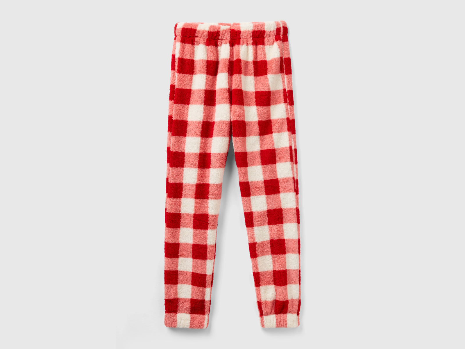Pantaloni a quadri in pelliccetta da donna rosso | Benetton Outlet