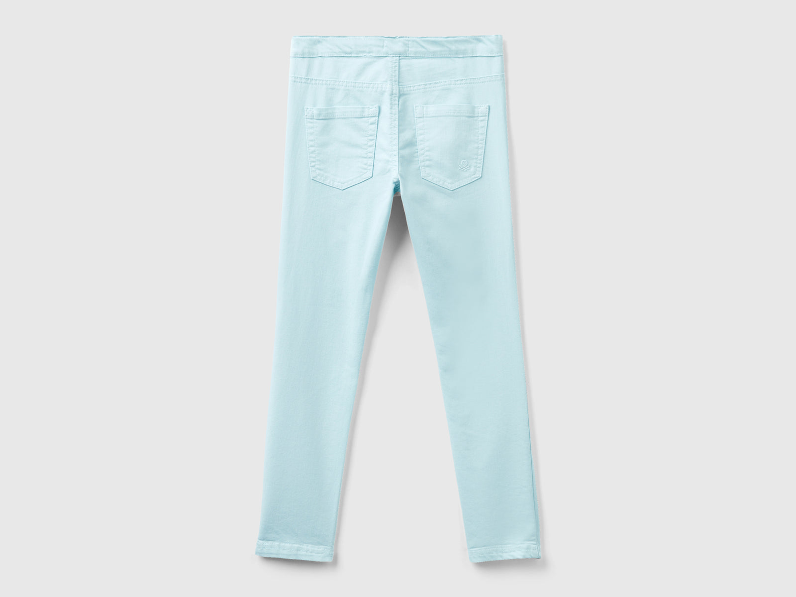 Pantaloni super skinny da bambina azzurro 2 | Benetton Outlet