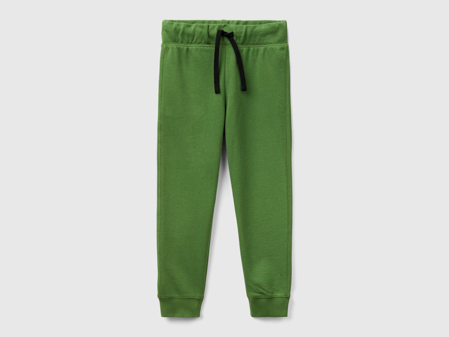 Pantaloni in felpa 100% cotone da bambino verde militare | Benetton Outlet