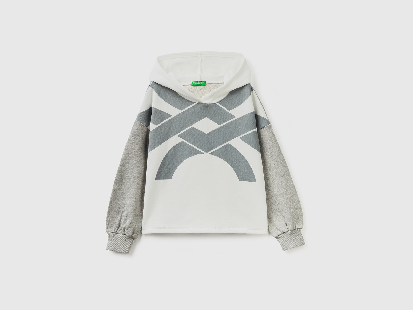 Felpa over fit con cappuccio da bambina bianco panna | Benetton Outlet