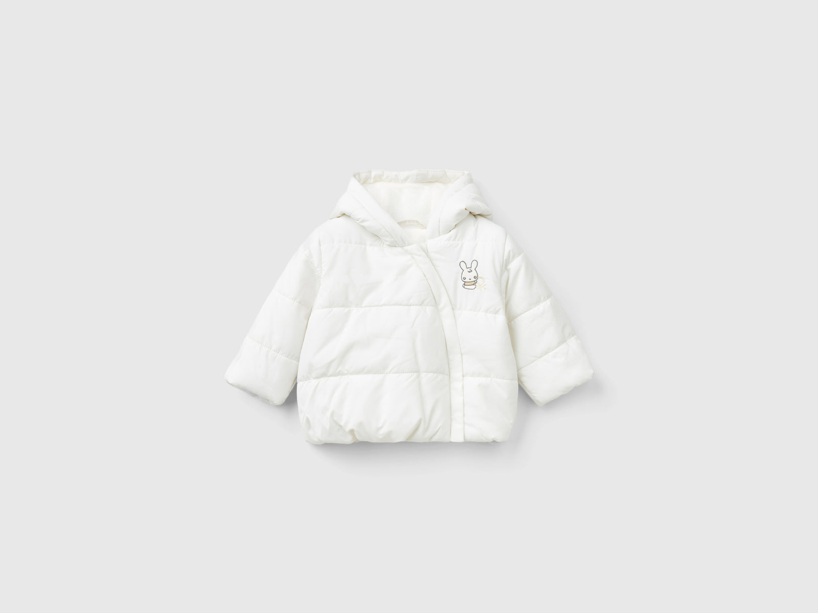 Giubbino imbottito con cappuccio da neonato bianco panna | Benetton Outlet
