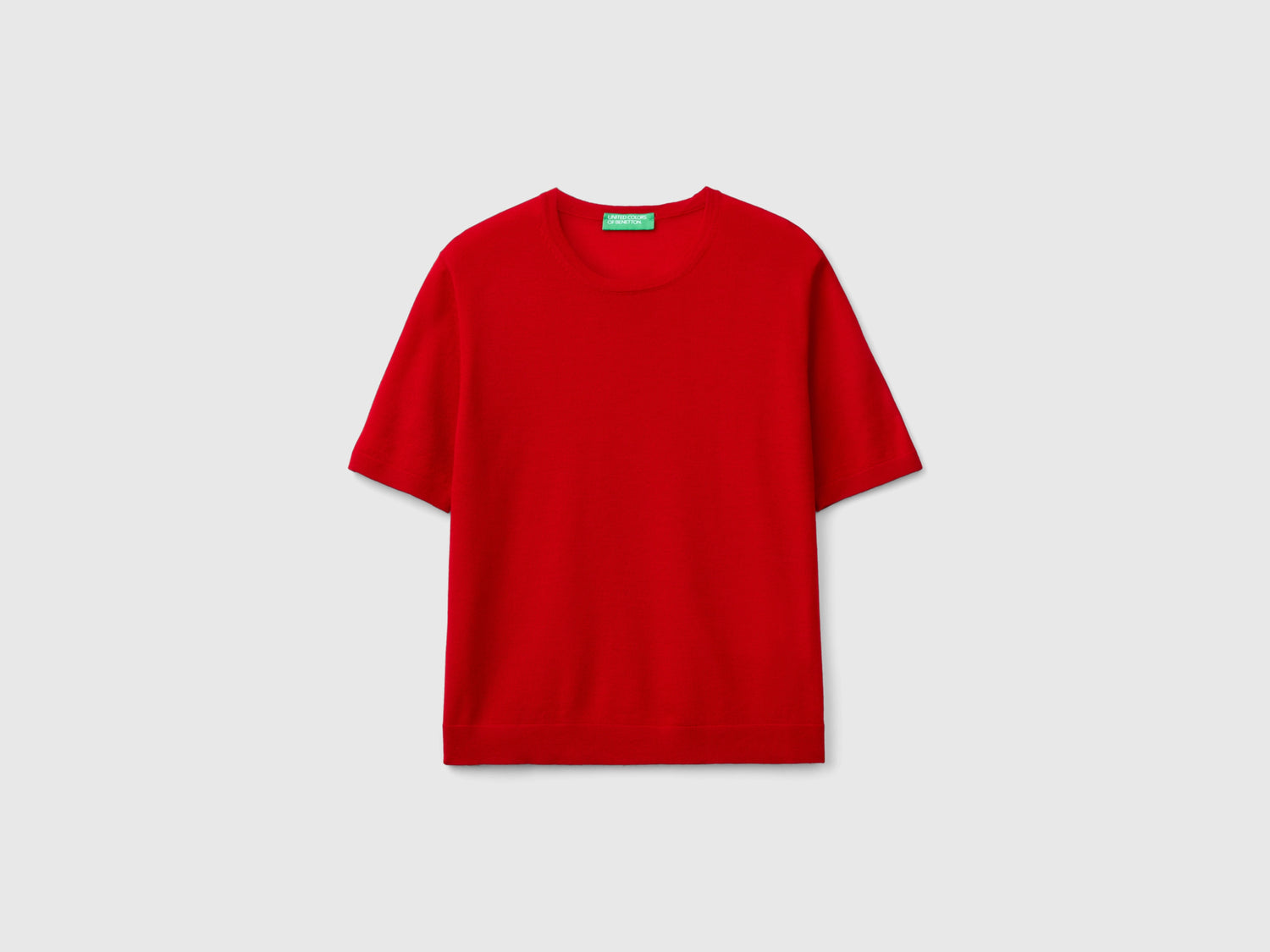 Maglia manica corta in pura lana Merino da donna rosso | Benetton Outlet