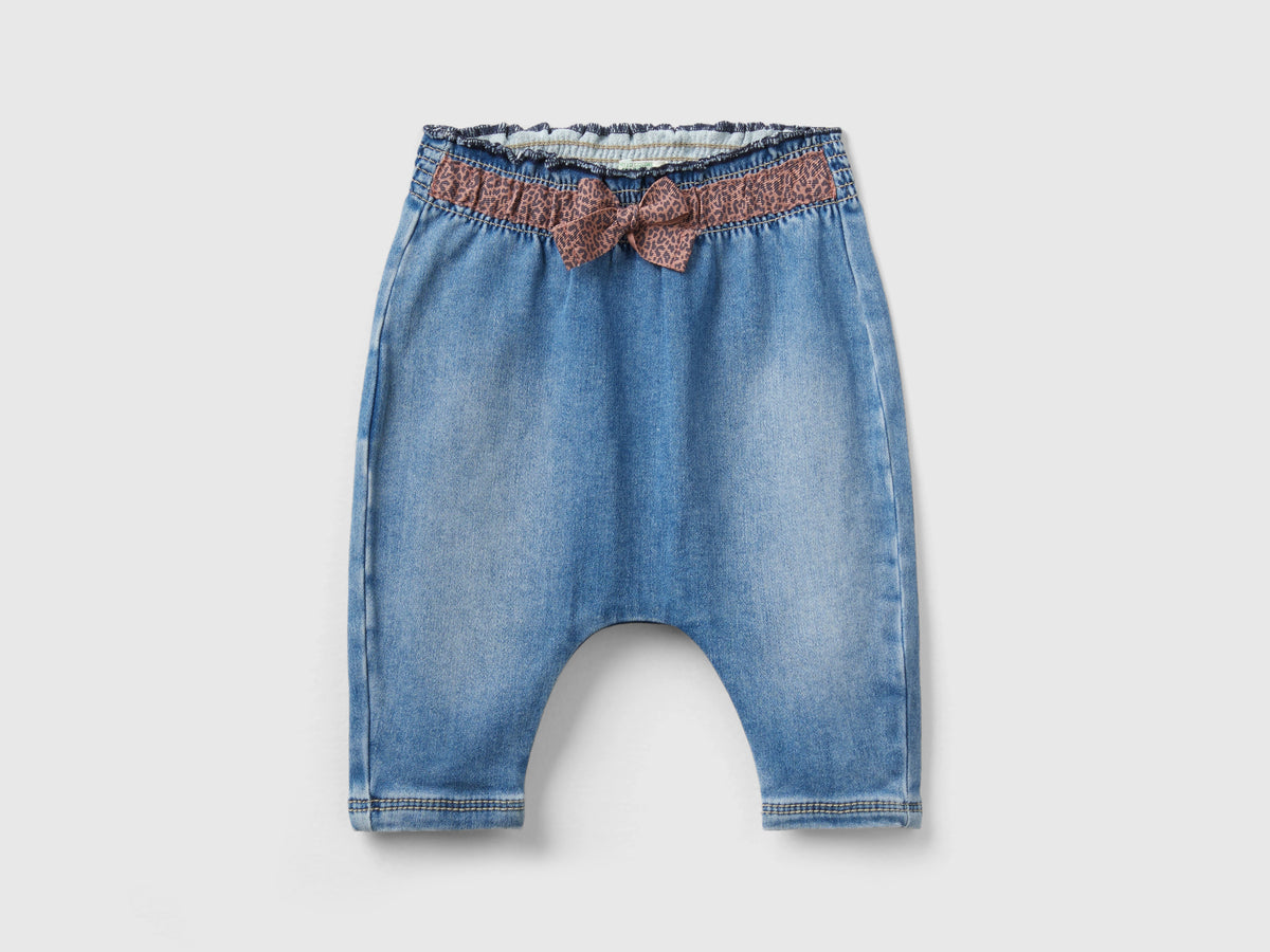 Jeans termici con fiocco animalier