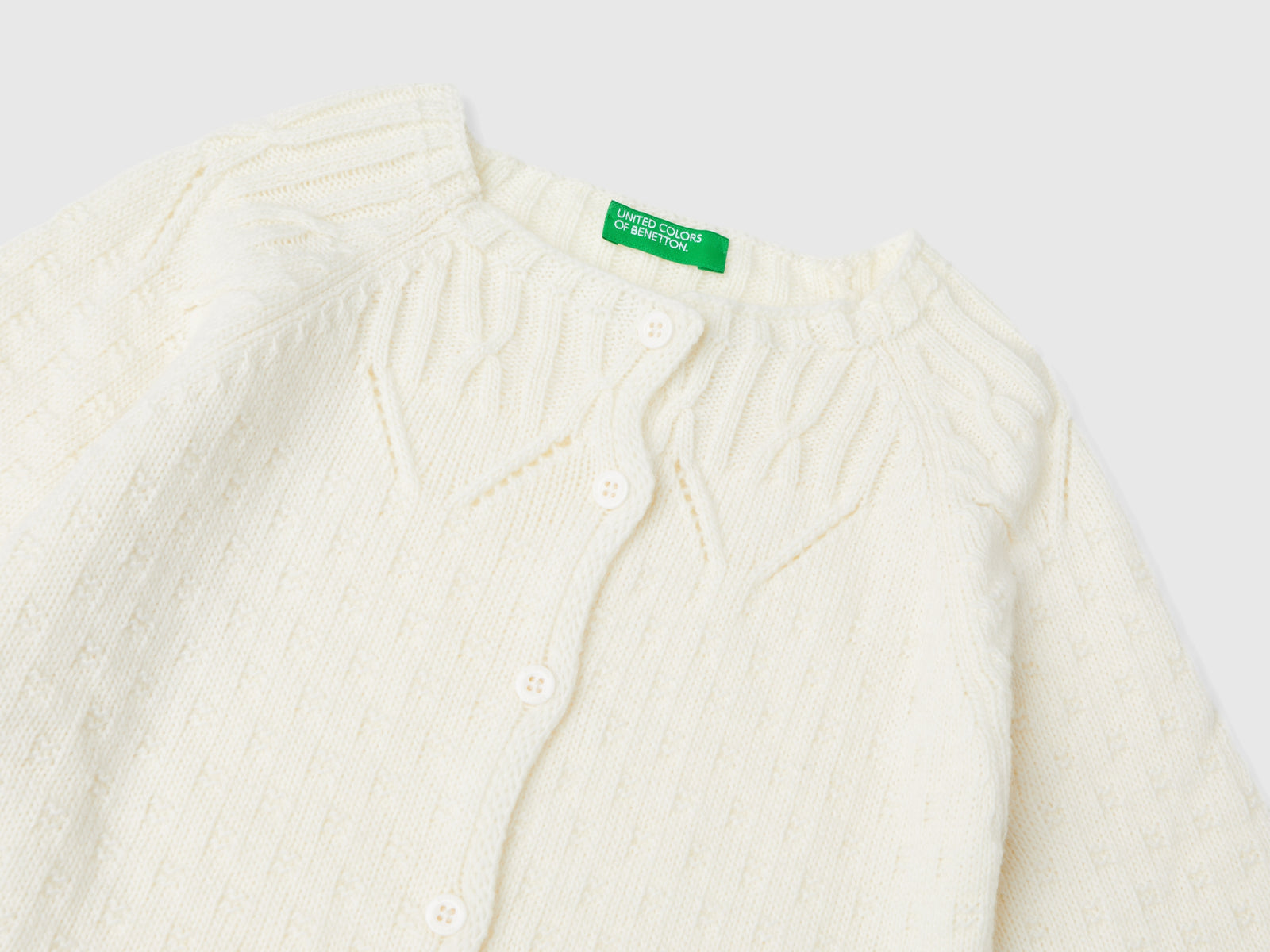 Cardigan con dettagli traforati da bimba bianco panna 3 | Benetton Outlet