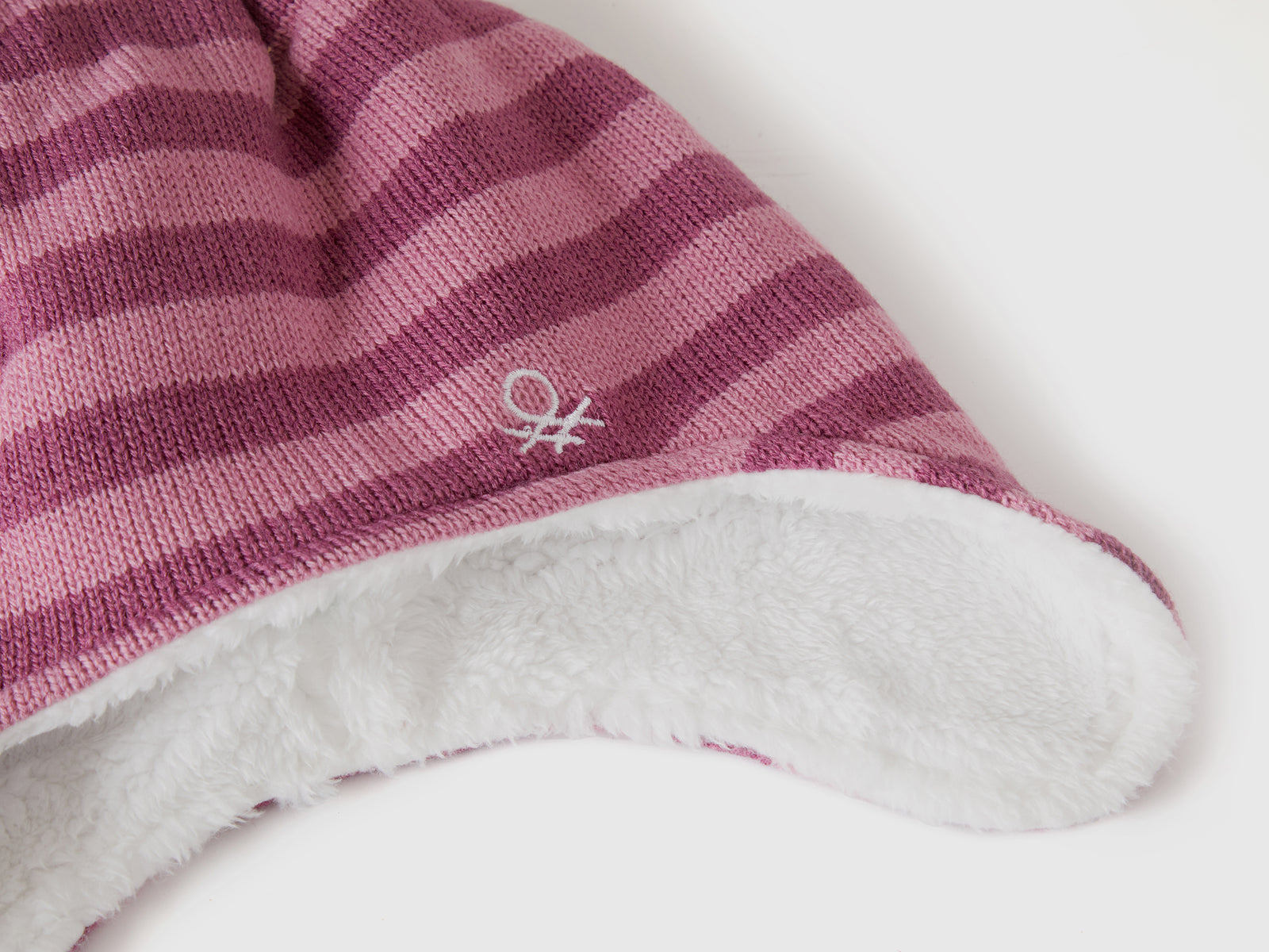 Cappello con paraorecchie e pom pom da bimba malva scuro 3 | Benetton Outlet