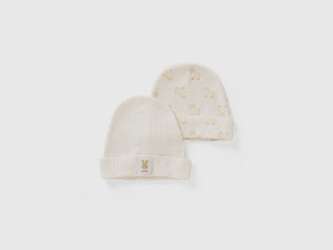 Due cappellini in cotone bio