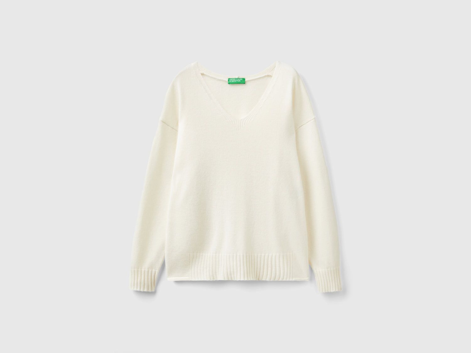 Maglia scollo a V in misto lana da donna bianco panna | Benetton Outlet