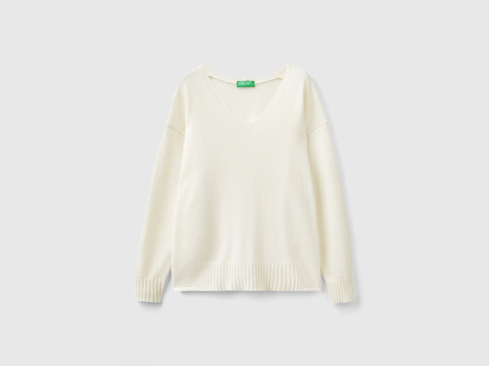 Maglia scollo a V in misto lana da donna bianco panna | Benetton Outlet