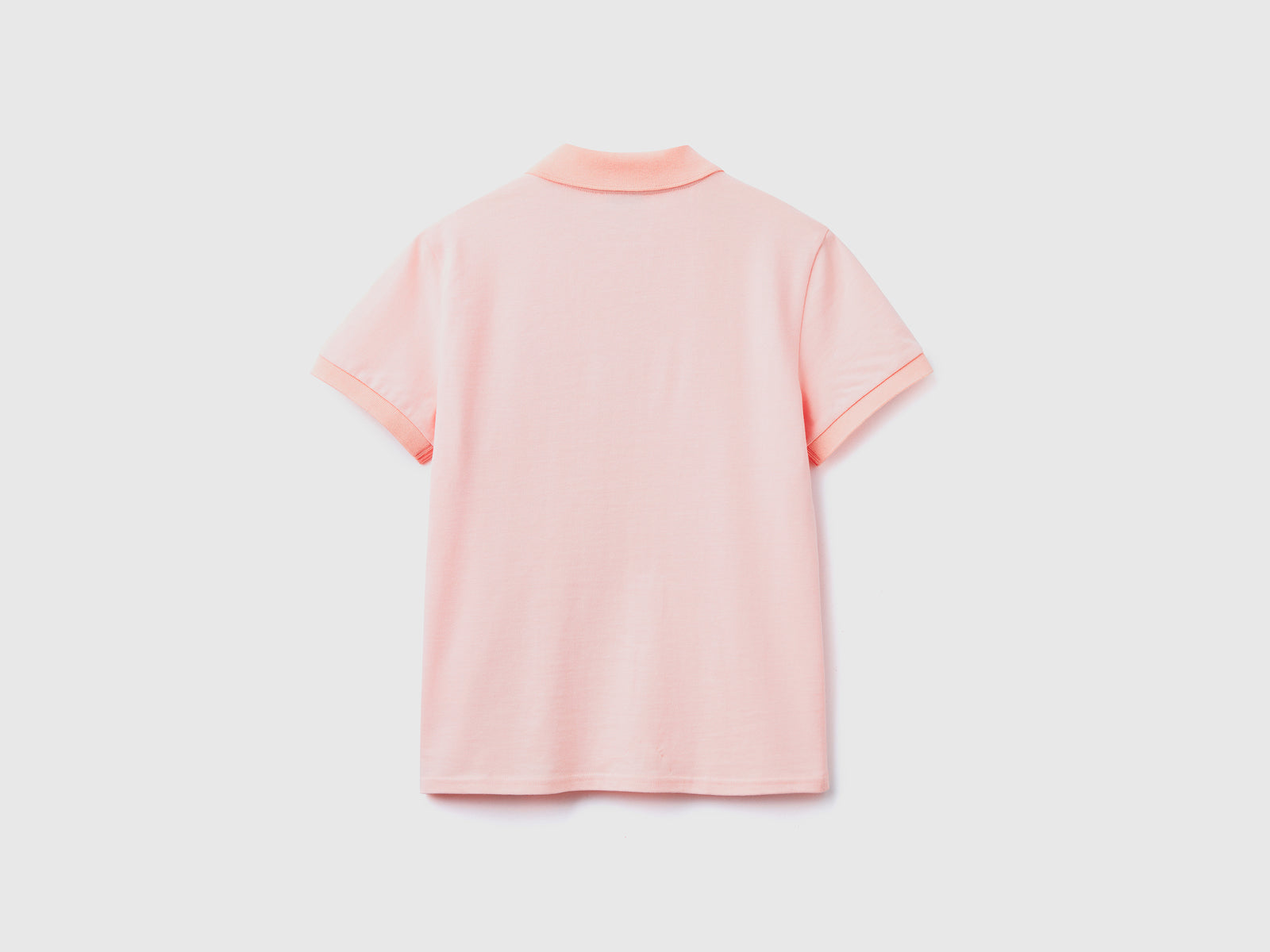Polo con ricamo frutta da donna rosa tenue 2 | Benetton Outlet