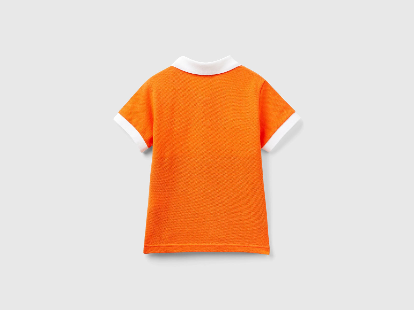 Polo color block con patch da bimbo arancione 2 | Benetton Outlet