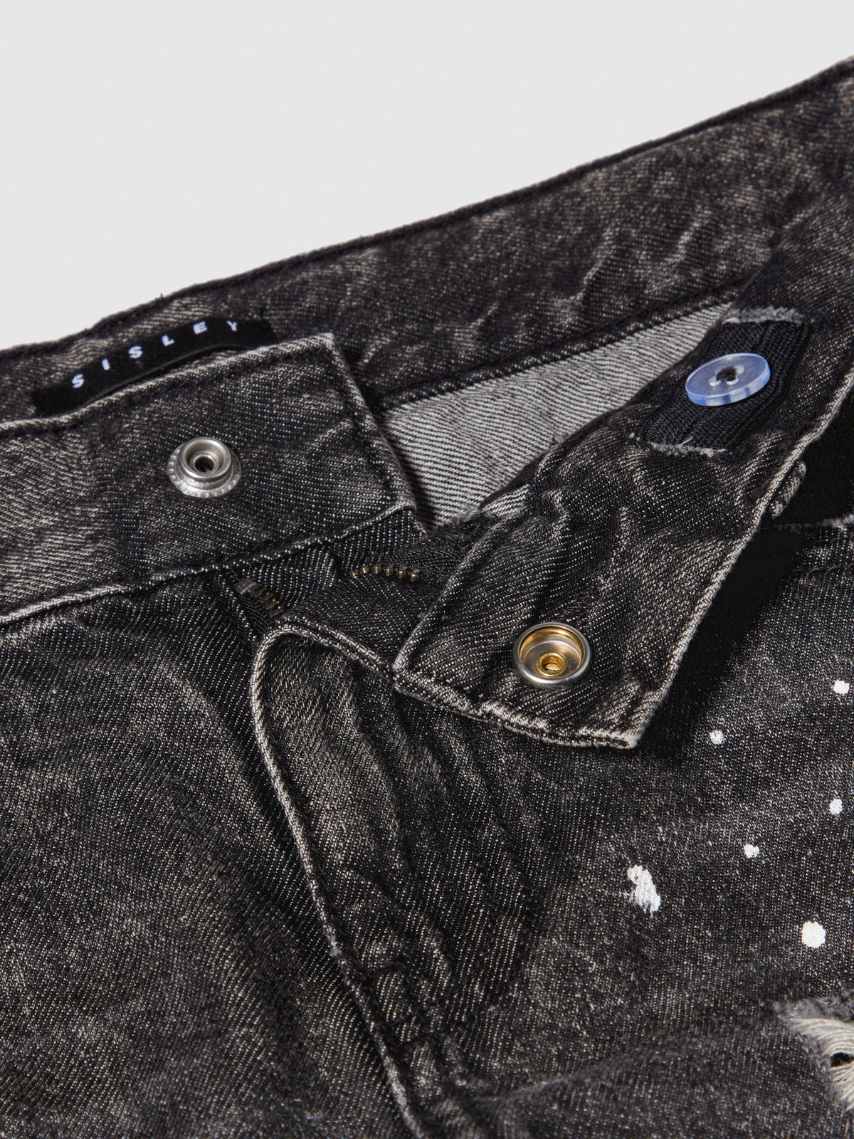 Jeans baggy effetto spruzzato