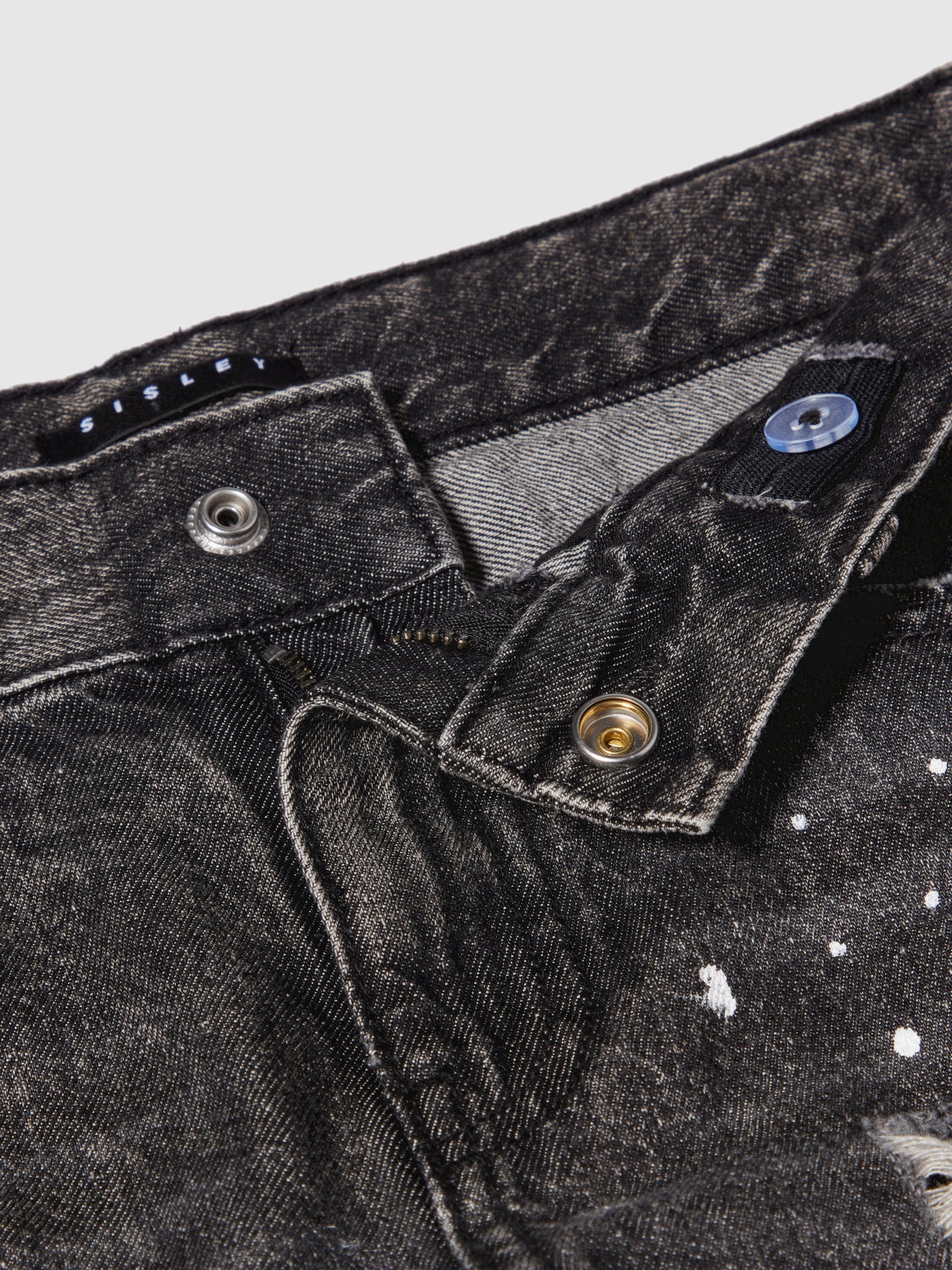 Jeans baggy effetto spruzzato da bambino nero 3 | Sisley young Outlet