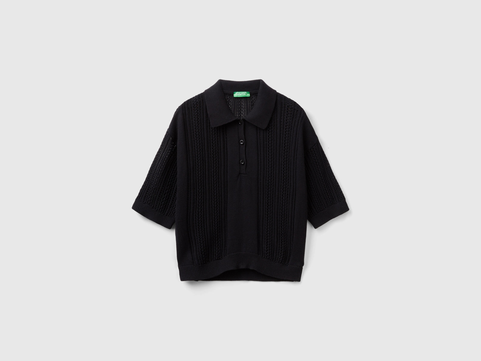 Polo in maglia crochet da donna nero | Benetton Outlet