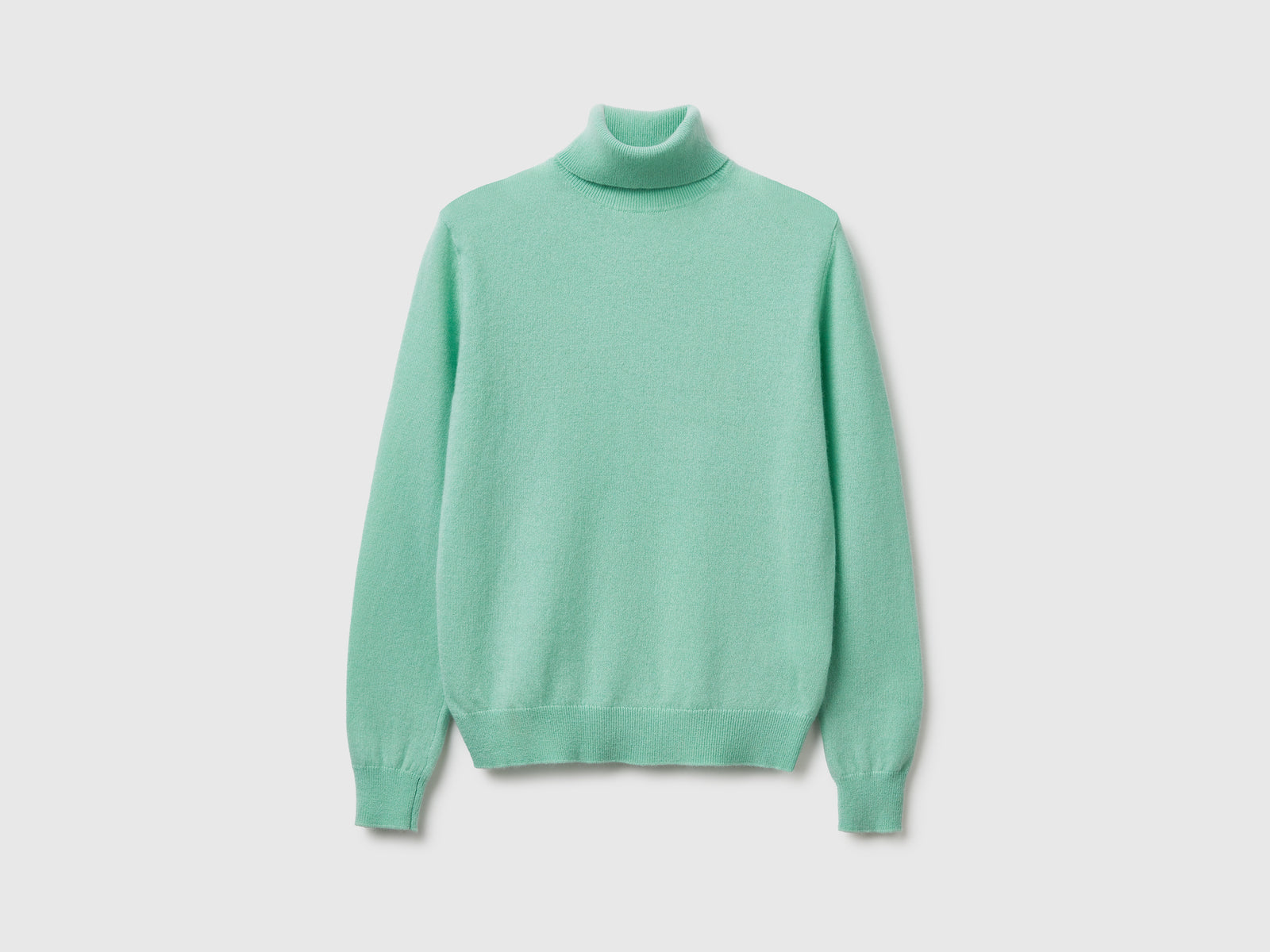 Maglione dolcevita in pura lana Merino da donna verde chiaro | Benetton Outlet