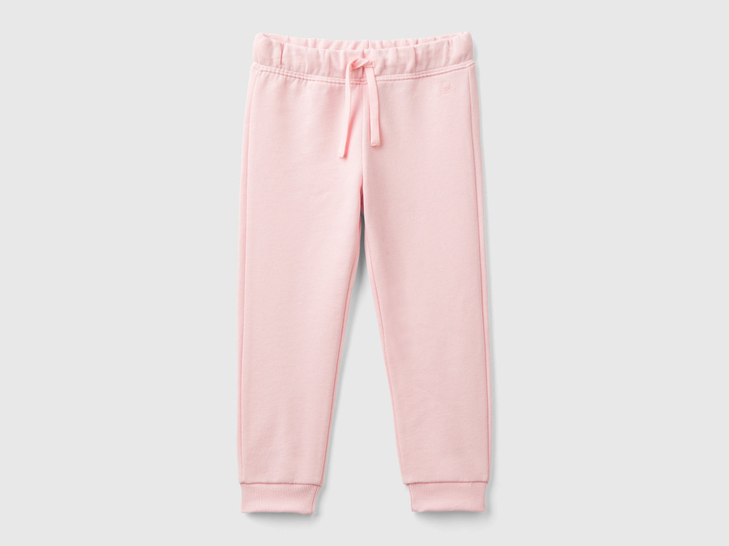 Pantaloni in felpa di cotone bio da bimba rosa | Benetton Outlet