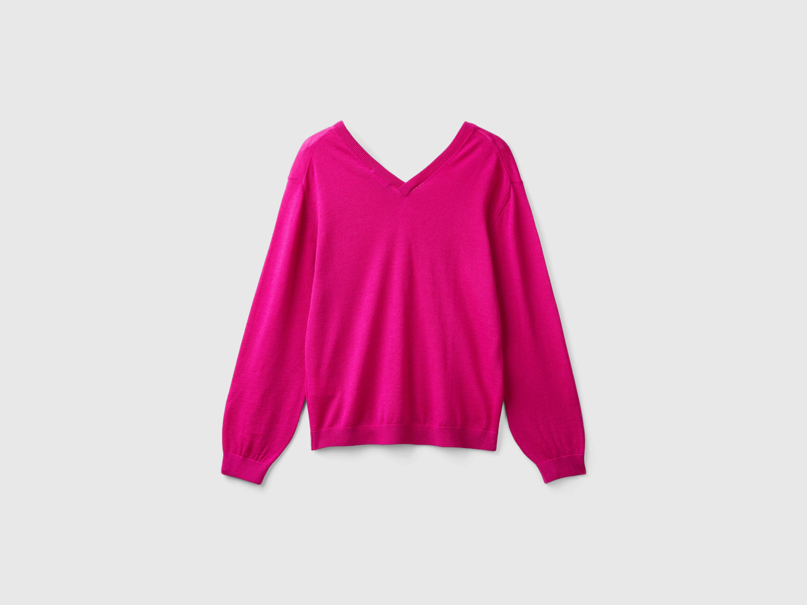 Maglia scollo a V in pura lana Merino da donna ciclamino 2 | Benetton Outlet