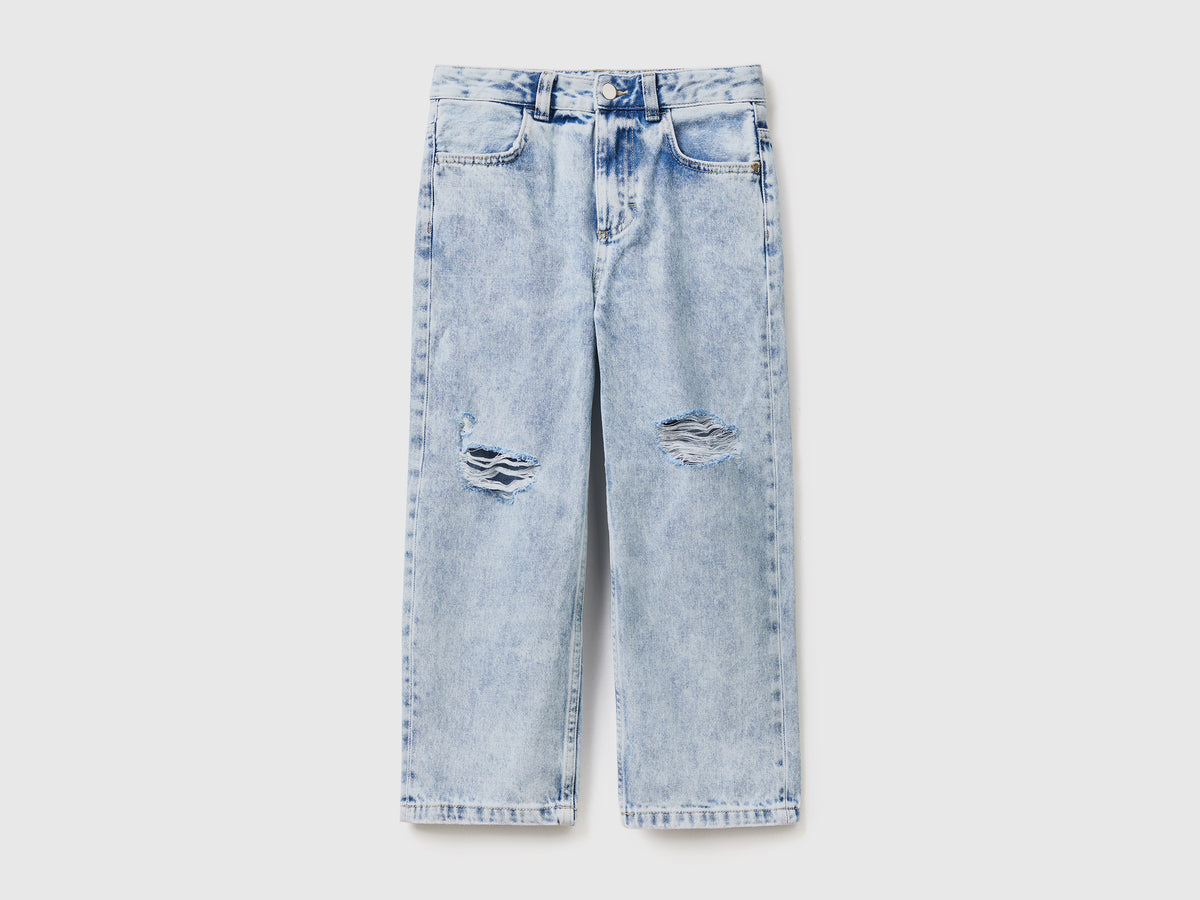 Pantaloni lunghi baggy fit in denim di puro cotone con rotture