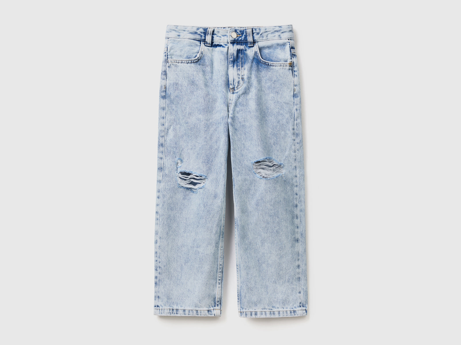 Pantaloni lunghi baggy fit in denim di puro cotone con rotture da bambino azzurro | Benetton Outlet