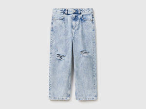 Pantaloni lunghi baggy fit in denim di puro cotone con rotture
