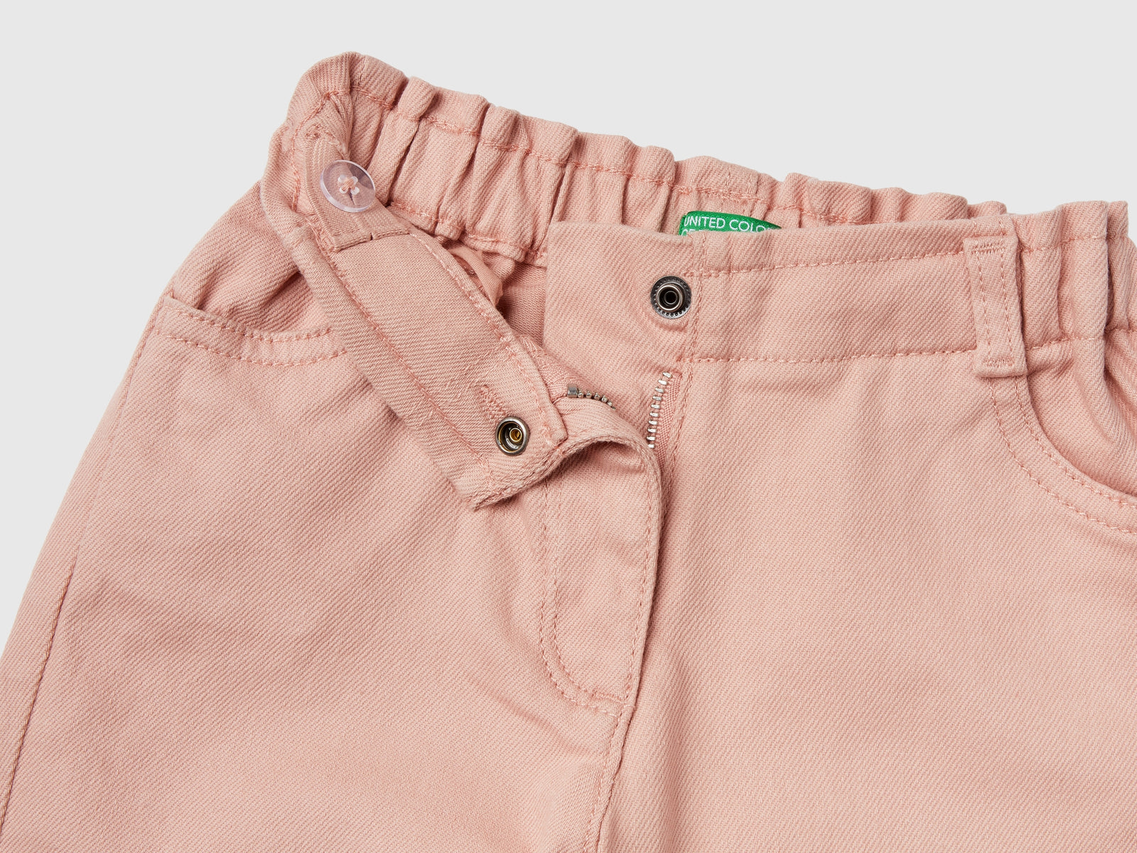 Pantaloni paperbag da bimba rosa pastello 3 | Benetton Outlet