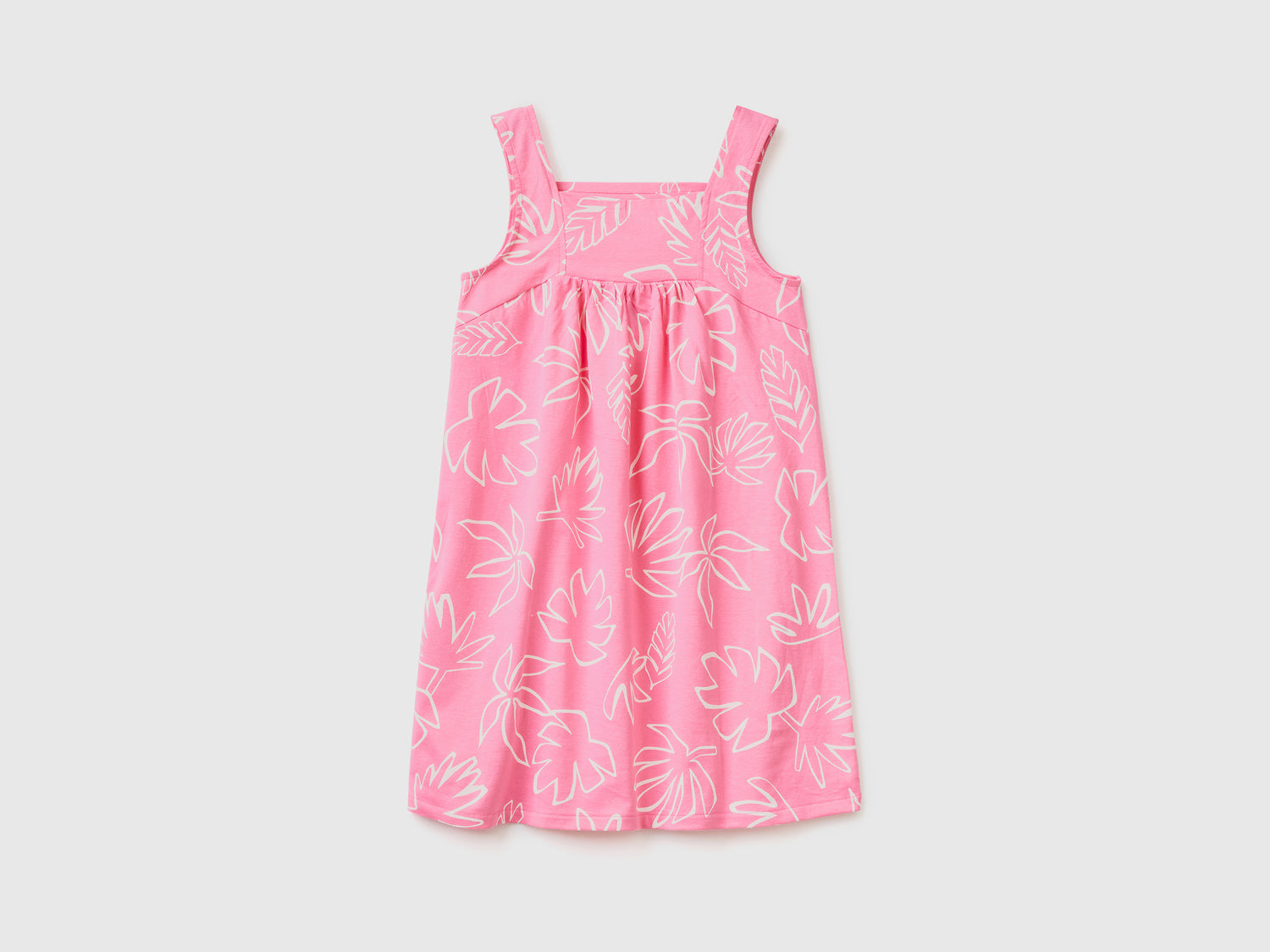 Vestito girocollo smanicato in puro cotone con lunghezza sotto il ginocchio da bambina rosa | Benetton Outlet